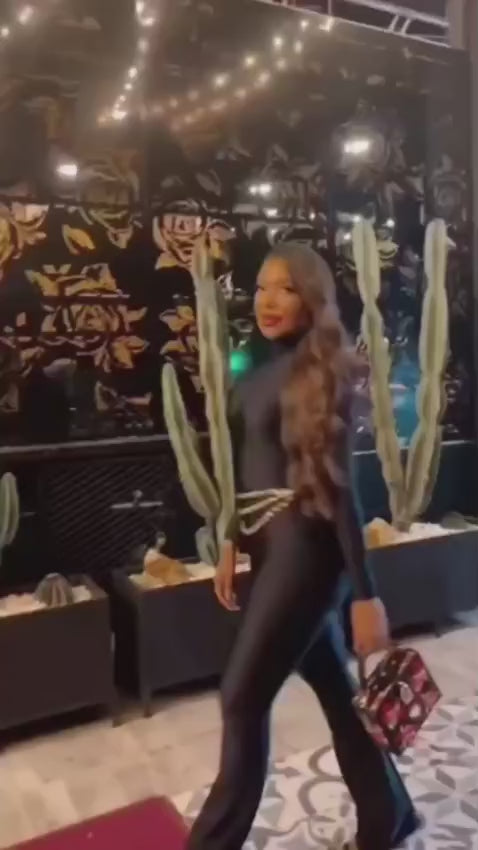 50-180 Enterizo espalda descubierta bota campana